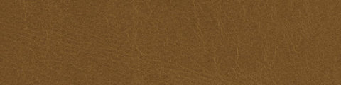 Close-up of honey-toned leather displaying a smooth surface with subtle grain and delicate natural creases
