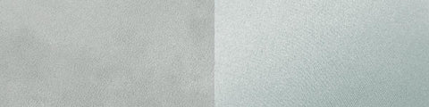 Close-up of two fabric swatches in light gray and pale blue with soft, textured surfaces side by side.