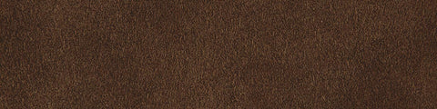 Close-up of warm saddle-brown suede showing a soft, finely napped texture with natural subtle tonal variations throughout