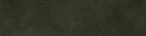 Textured dark green fabric surface with a soft, velvety appearance and subtle color variations