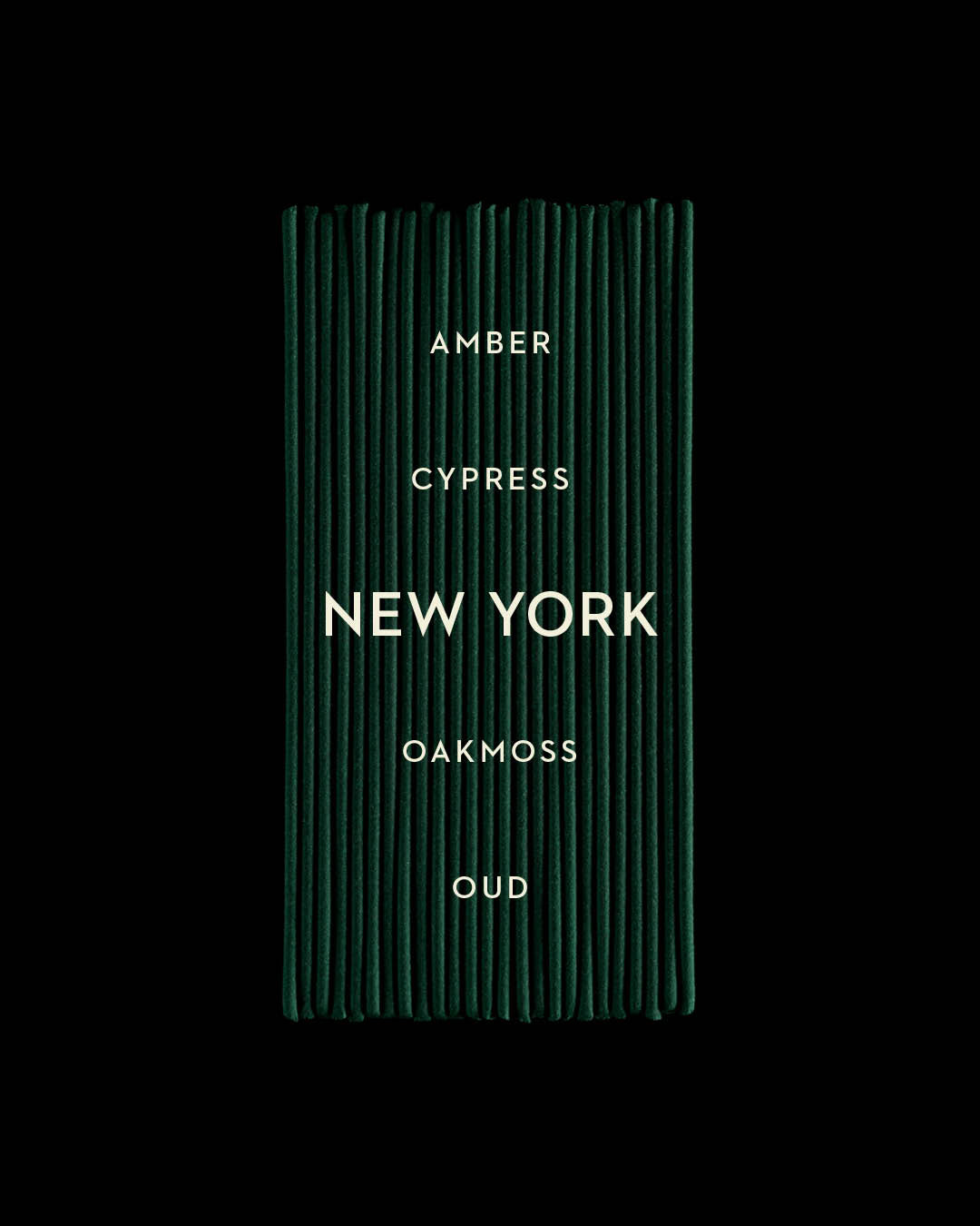 Stacked dark green incense sticks with white text listing amber, cypress, oakmoss, and oud on a black background