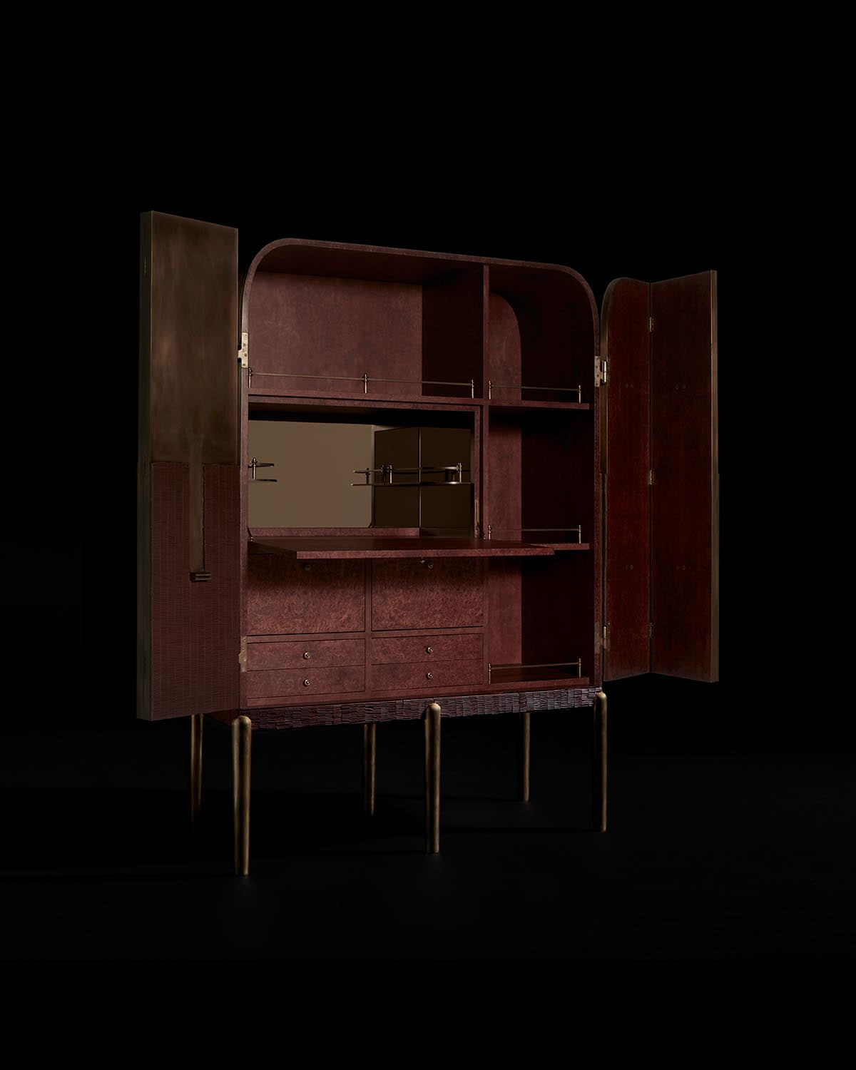 Dark wood cabinet with open doors revealing shelves, drawers, and brass legs against a black background