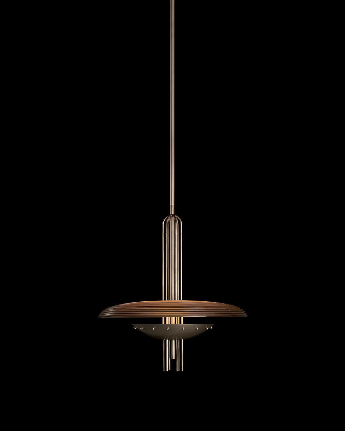 Suspended modern pendant light with concentric circular metal shades and vertical rod details against a black background