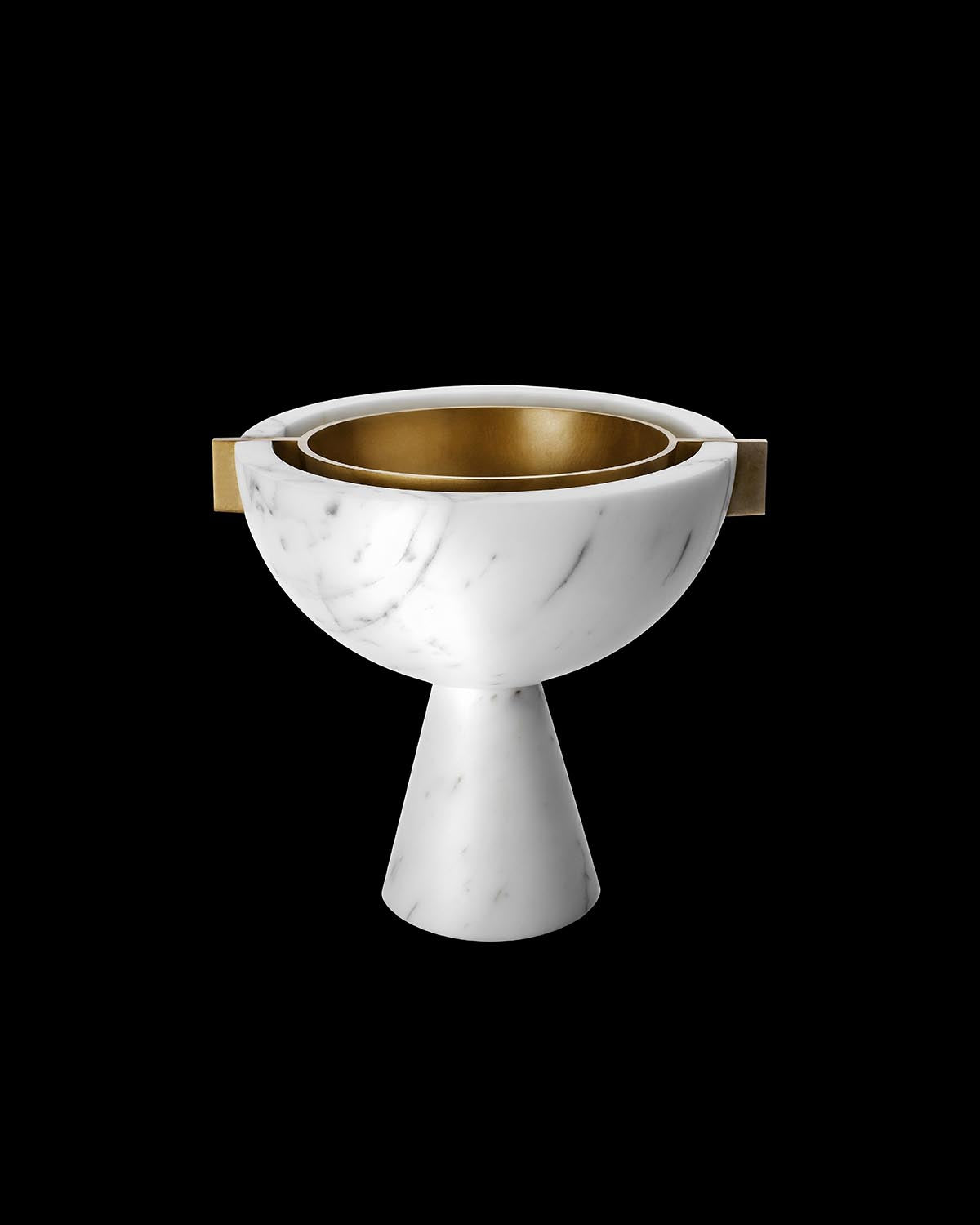 White marble vessel with conical base and metallic gold inner bowl against a black background
