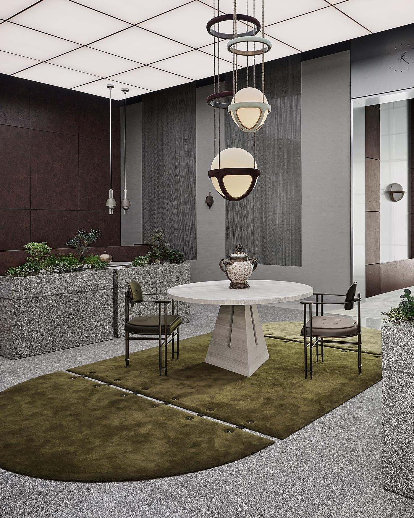 Modern dining area with round white table, two metal-framed chairs, geometric pendant lights, and olive green rug