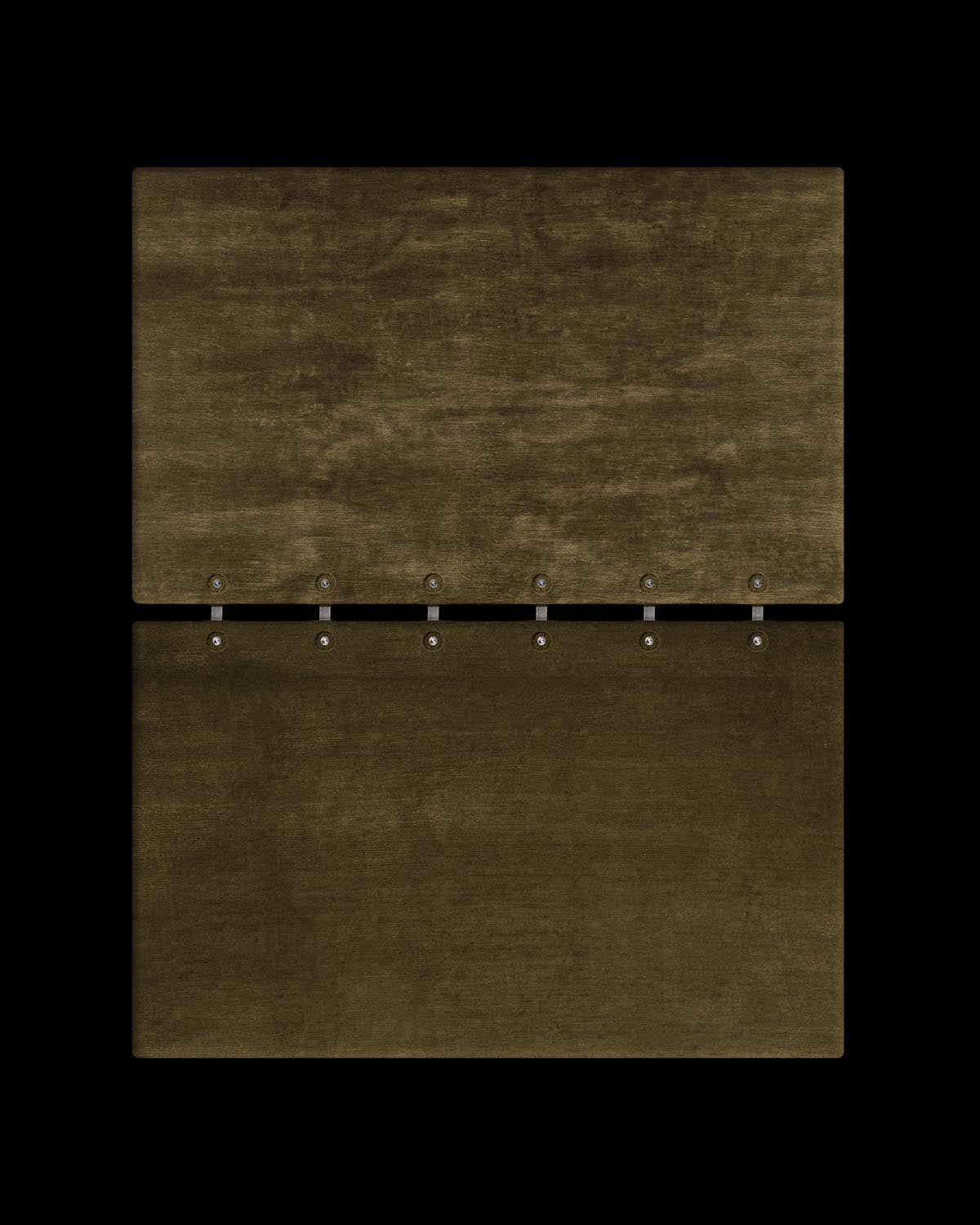 Top view of dark olive green rectangular panels connected by metal fasteners against a black background