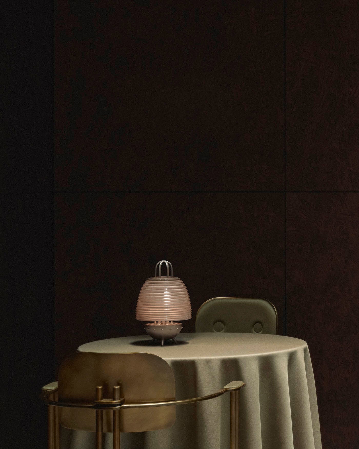 Modern SIGNAL X table lamp with ribbed glass shade on round table covered with beige cloth and green velvet chair