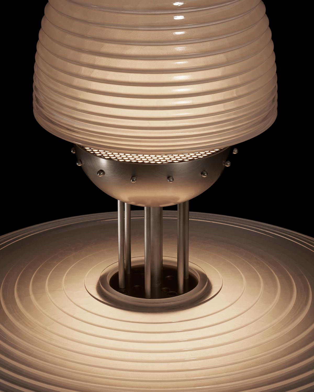 Close-up of SIGNAL Z pendant light with ribbed shade and industrial metal details against black background