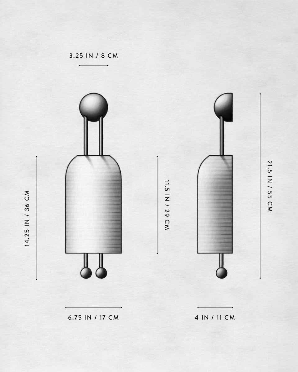 Technical drawing of a geometric object with dimensions labeled in inches and centimeters on a textured white background