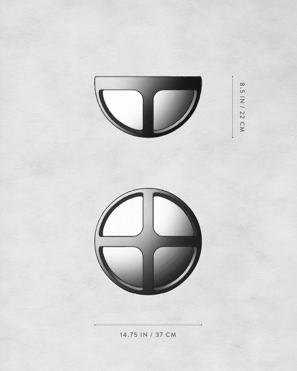 Top view of two black and white geometric shapes, one semicircle and one circle, with dimensions on a gray background