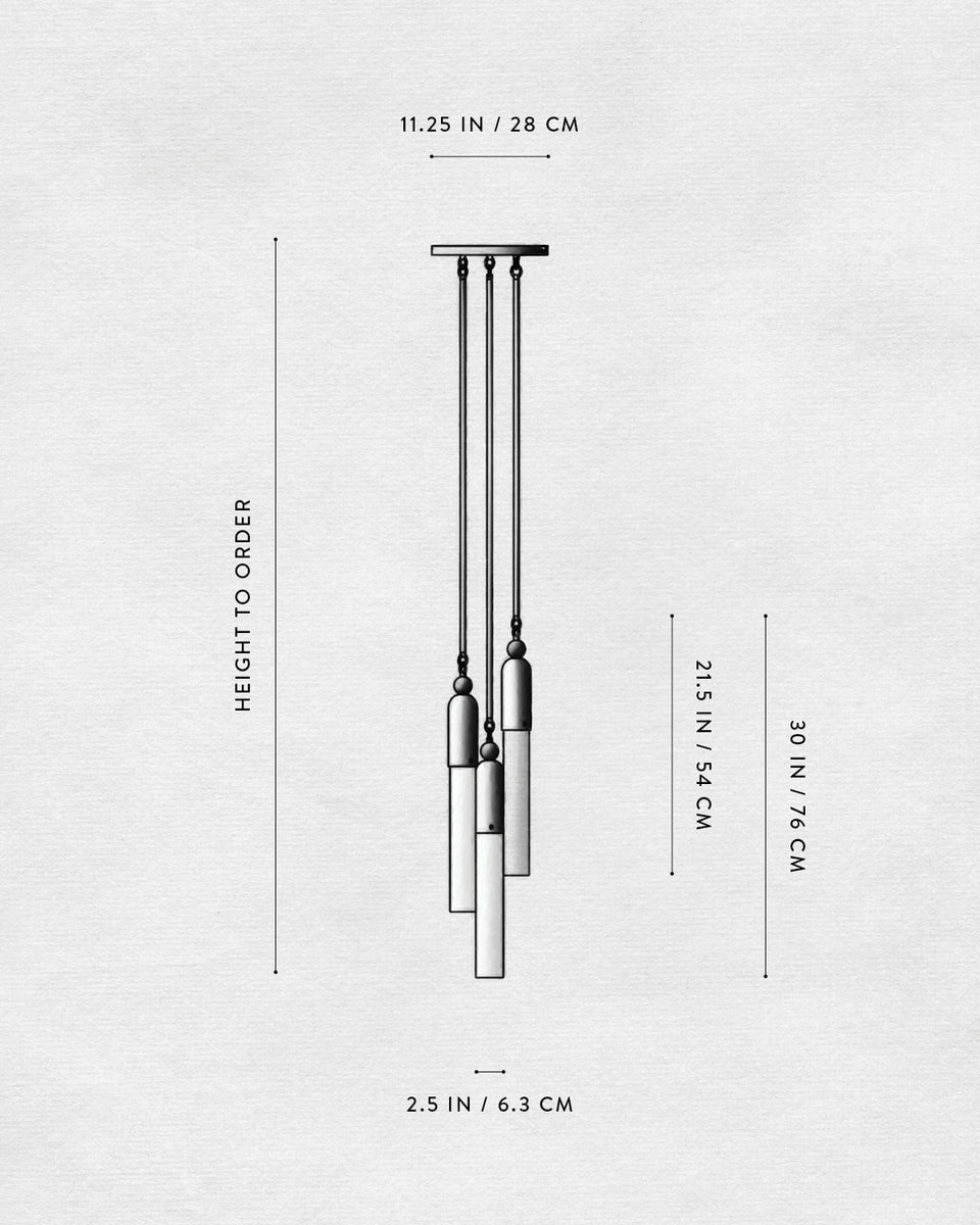 Technical drawing of a triple pendant light fixture with dimensions labeled in inches and centimeters on a textured background