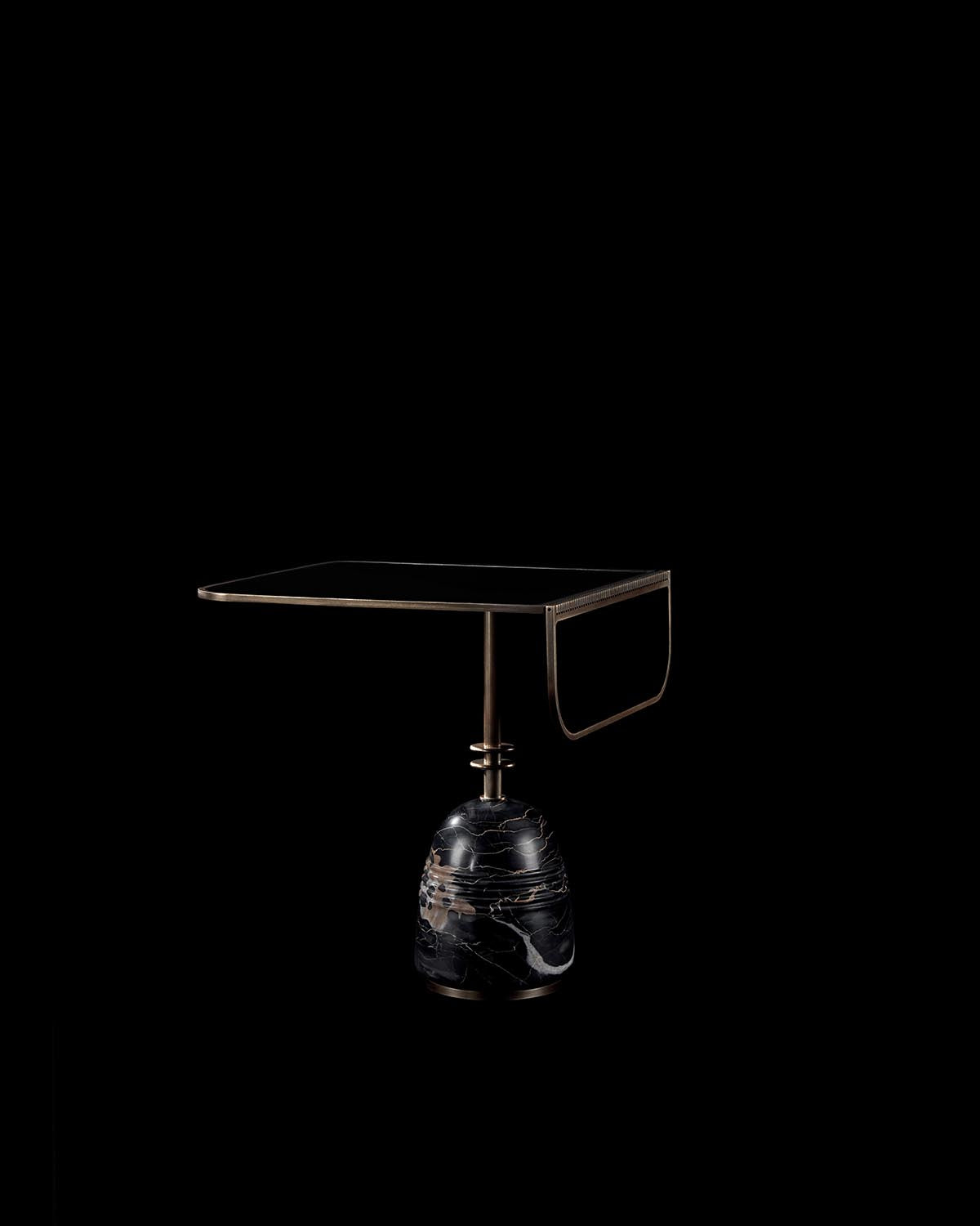 Side table with black marble base and thin metal frame supporting a rectangular tabletop against a black background