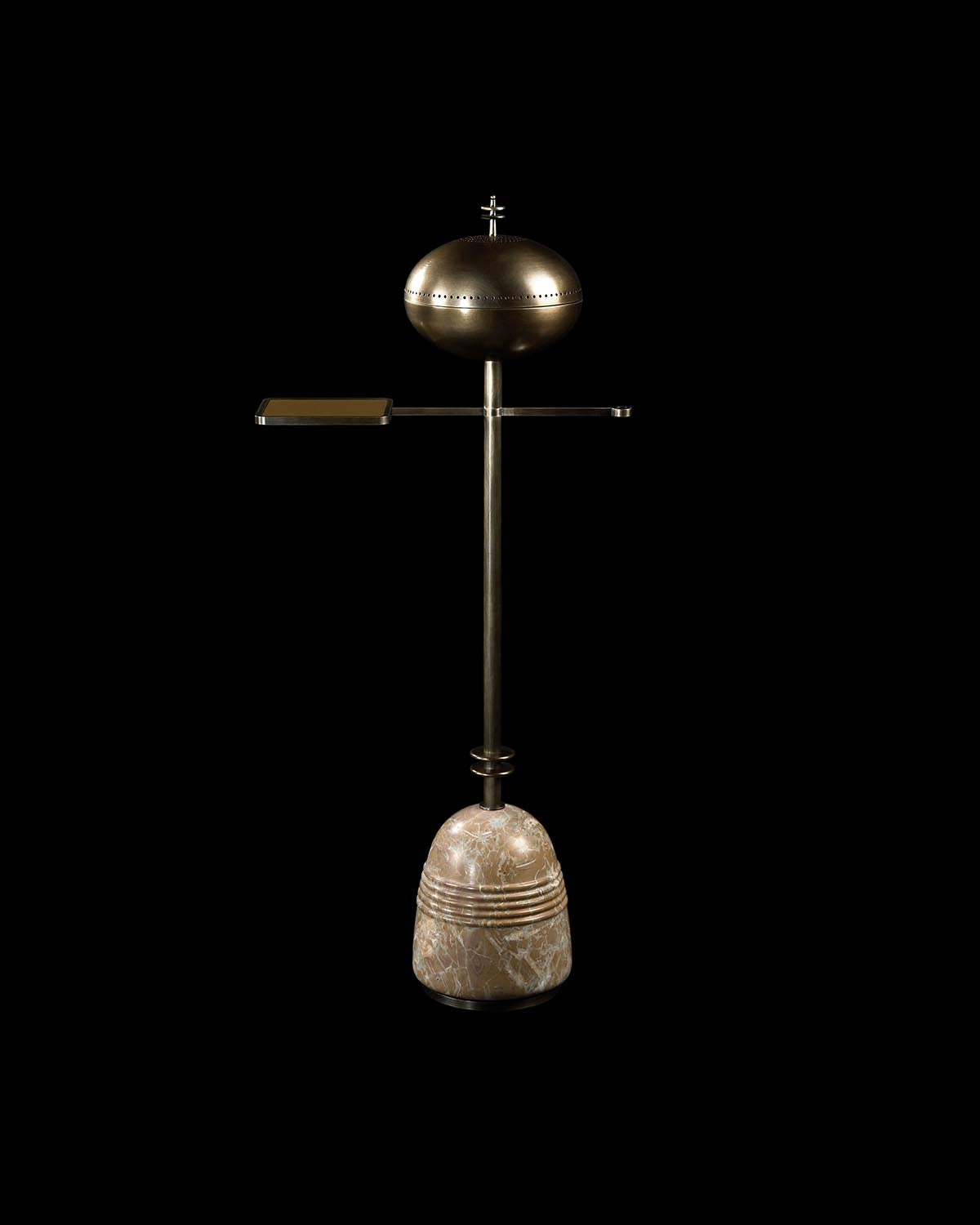 Slim metallic smoking table with spherical top and marble base against a black background