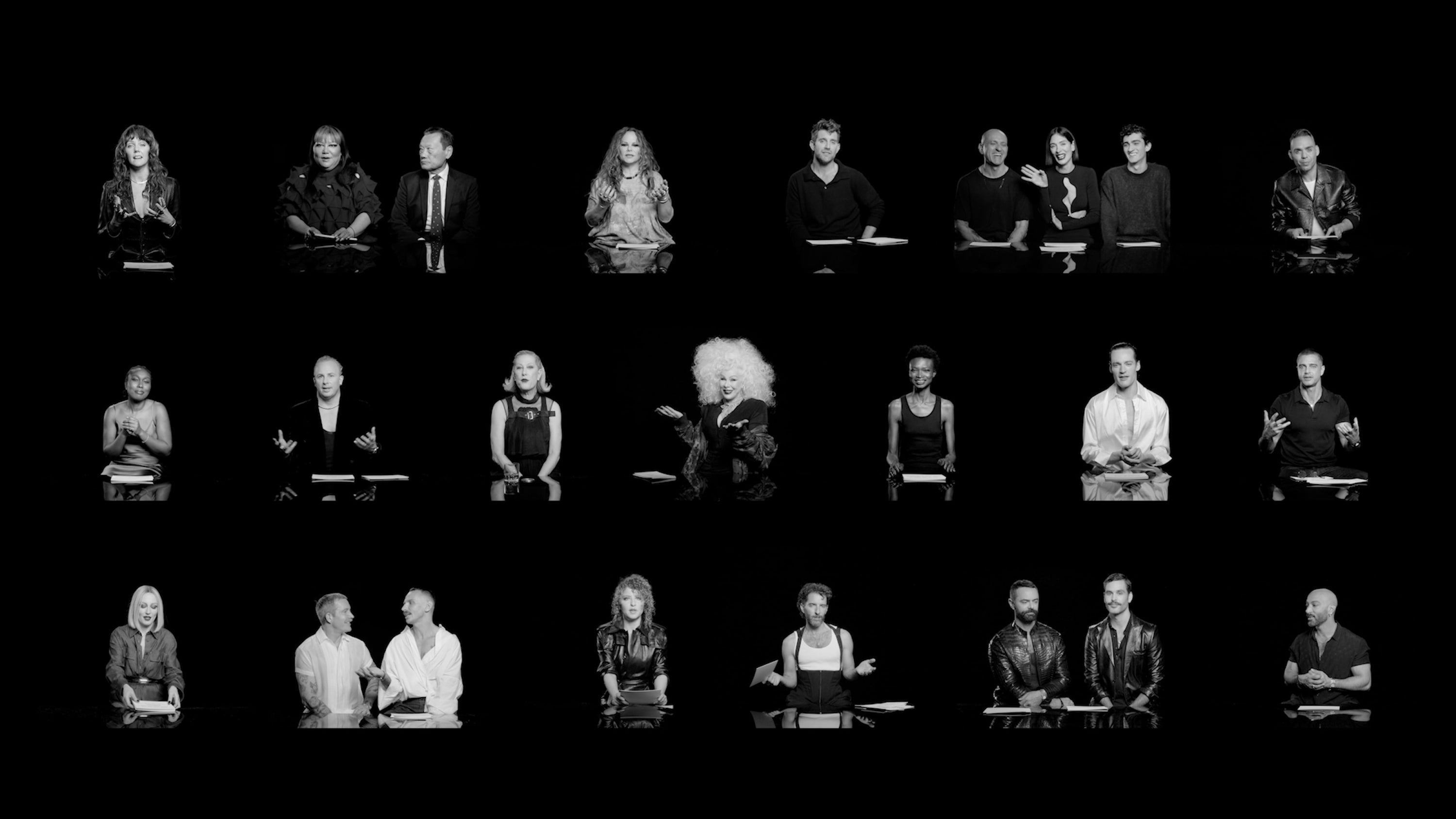 Grid of 20 black-and-white portraits of diverse individuals seated against a black background with dramatic lighting.