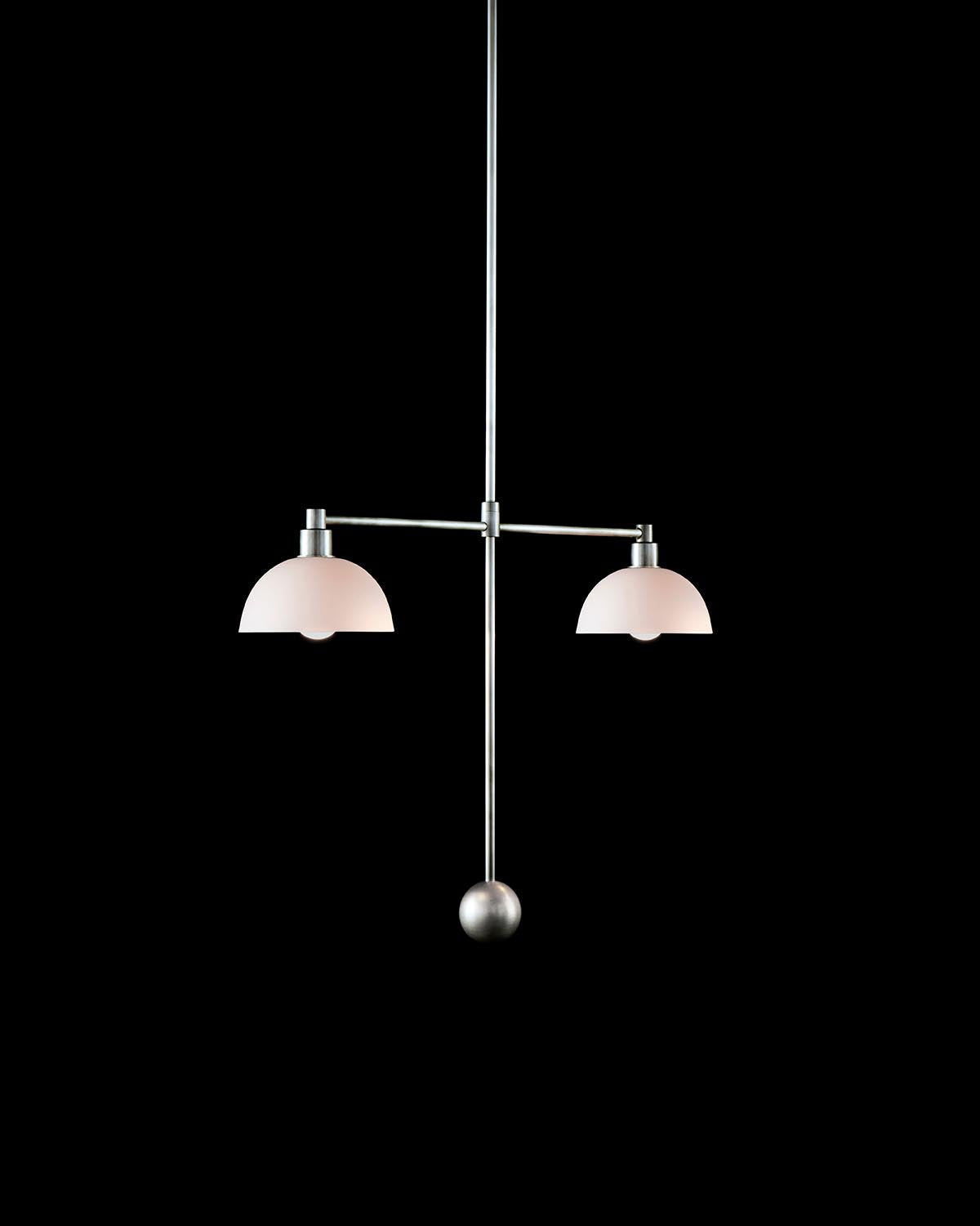 Minimalist pendant light fixture with two frosted glass dome shades and brushed metal rod against black background