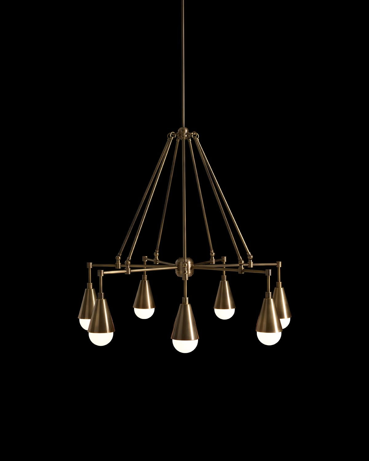 Modern seven-light pendant chandelier with brass finishes and conical shades suspended on thin rods against black background